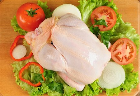 raw chicken on cutting board - Fresh chicken with vegetables Stock Photo - Budget Royalty-Free & Subscription, Code: 400-04625780