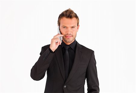 simsearch:400-04608943,k - Handsome businessman talking on the phone looking at the camera Stock Photo - Budget Royalty-Free & Subscription, Code: 400-04625983