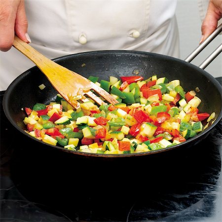 Chef frying peppers Foto de stock - Super Valor sin royalties y Suscripción, Código: 400-04626168