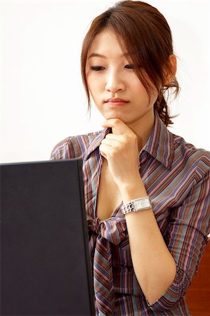 simsearch:400-04008684,k - Asian businesswoman, working on her laptop. Stockbilder - Microstock & Abonnement, Bildnummer: 400-04627188