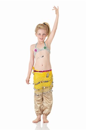 Young Caucasian belly dancing girl in beautiful decorated clothes on white background and reflective floor. Not isolated Photographie de stock - Aubaine LD & Abonnement, Code: 400-04627211