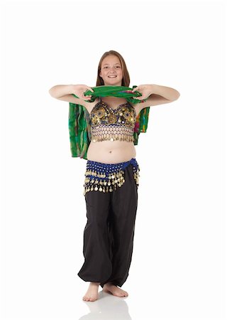 simsearch:400-05154700,k - Young Caucasian belly dancing girl in beautiful decorated clothes on white background and reflective floor. Not isolated Stock Photo - Budget Royalty-Free & Subscription, Code: 400-04627291