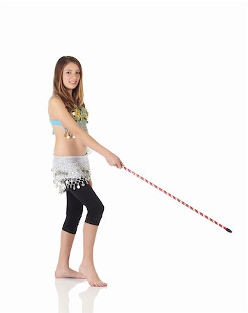 simsearch:400-05154700,k - Young Caucasian belly dancing girl in beautiful decorated clothes on white background and reflective floor. Not isolated Stock Photo - Budget Royalty-Free & Subscription, Code: 400-04627301