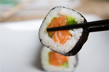 Fresh japanese salmon sushi served on a white plate Stock Photo - Budget Royalty-Free & Subscription, Code: 400-04627394