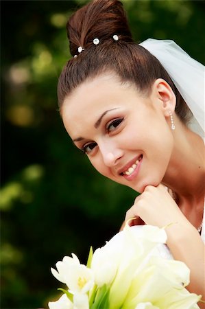 The beautiful bride on a green background Stock Photo - Budget Royalty-Free & Subscription, Code: 400-04627400