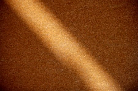 Rusted steel orange background texture. Beam of light crossing surface Stock Photo - Budget Royalty-Free & Subscription, Code: 400-04627597