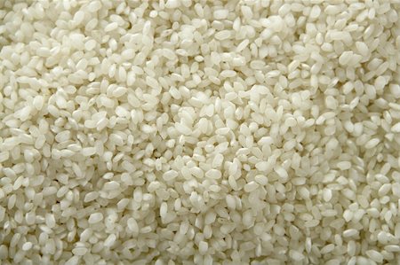 simsearch:400-05131654,k - White rice close up texture. Background pattern of rice seeds from Spain Stock Photo - Budget Royalty-Free & Subscription, Code: 400-04627599
