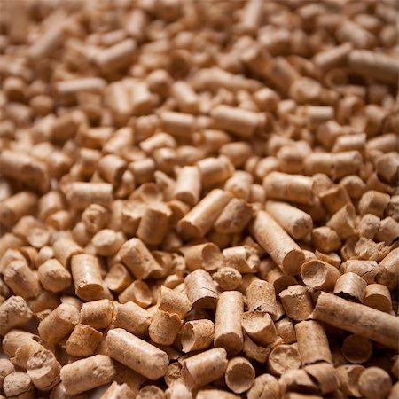 fireplace autumn - Wood pellets close-up texture background Stock Photo - Budget Royalty-Free & Subscription, Code: 400-04627887