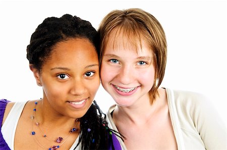 simsearch:614-02984866,k - Isolated portrait of two diverse teenage girl friends Stockbilder - Microstock & Abonnement, Bildnummer: 400-04628404