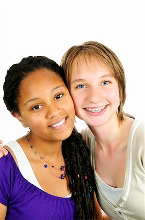 simsearch:614-02984866,k - Isolated portrait of two diverse teenage girl friends Stockbilder - Microstock & Abonnement, Bildnummer: 400-04628405