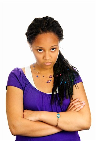 Isolated portrait of beautiful black teenage girl pouting Stock Photo - Budget Royalty-Free & Subscription, Code: 400-04628407