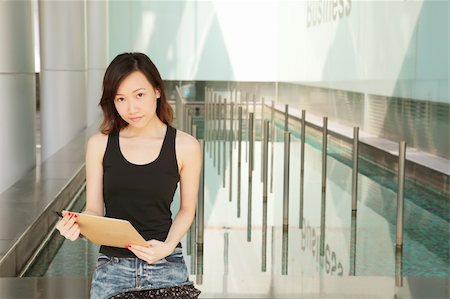 Asian Young Career Woman Outside an Office Photographie de stock - Aubaine LD & Abonnement, Code: 400-04628550