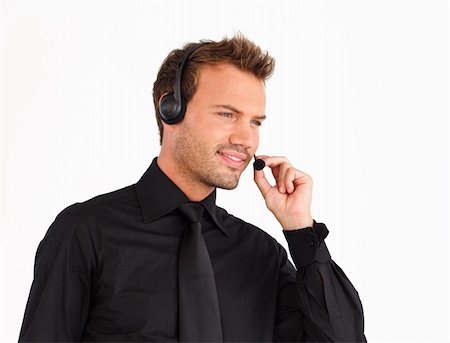 simsearch:400-04129170,k - Attractive businessman speaking on a headset Fotografie stock - Microstock e Abbonamento, Codice: 400-04629318