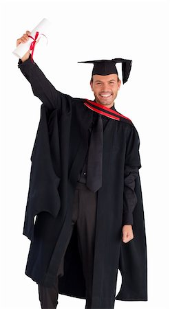 Happy attractive graduate smiling at the camera Stock Photo - Budget Royalty-Free & Subscription, Code: 400-04629323