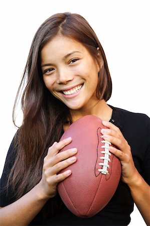 student athletes - Smiling woman holding american football. Isolated on white background. Stock Photo - Budget Royalty-Free & Subscription, Code: 400-04629700