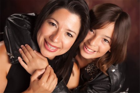 Attractive Hispanic Mother & Daughter Studio Portrait. Stock Photo - Budget Royalty-Free & Subscription, Code: 400-04629717