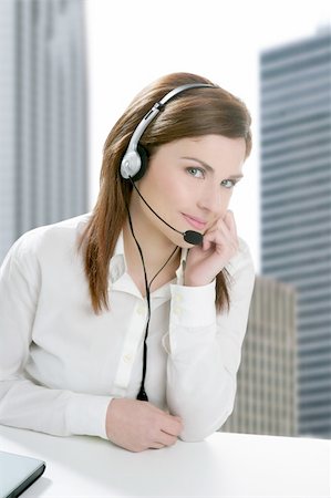 simsearch:400-05209692,k - Business helpdesk with beautiful woman and headphones micro Stock Photo - Budget Royalty-Free & Subscription, Code: 400-04629741