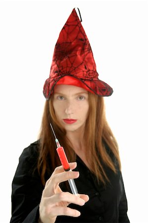 simsearch:400-08093594,k - Woman witch with red syringe, isolated on white background Foto de stock - Super Valor sin royalties y Suscripción, Código: 400-04629873