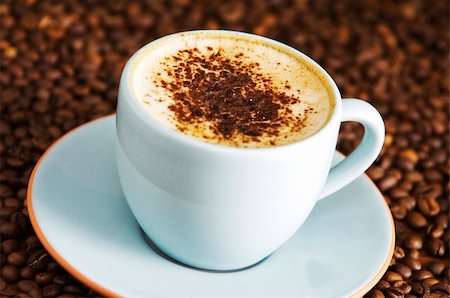 simsearch:400-04640830,k - cappuccino on coffee background Photographie de stock - Aubaine LD & Abonnement, Code: 400-04621326