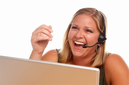 simsearch:400-05098432,k - Attractive businesswoman Laughs as she talks on her phone headset. Photographie de stock - Aubaine LD & Abonnement, Code: 400-04621536