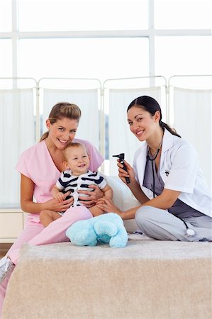 stethoscope girl and boy - Baby with pediatrician and nurse in hospital with copy-space Stock Photo - Budget Royalty-Free & Subscription, Code: 400-04621644