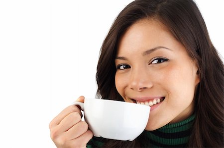Beautiful young woman enjoying a coffee. Isolated on white background. Stock Photo - Budget Royalty-Free & Subscription, Code: 400-04621743