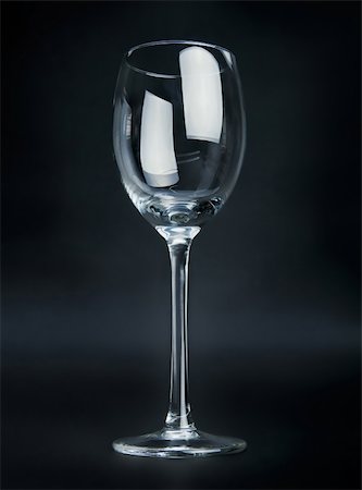 simsearch:400-09117705,k - Empty wineglass on black background Stock Photo - Budget Royalty-Free & Subscription, Code: 400-04621867