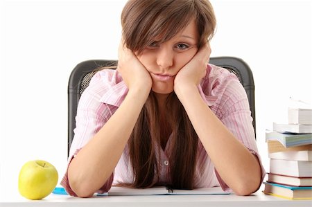simsearch:400-04622035,k - Teenage girl studying with textbooks looking unhappy Stock Photo - Budget Royalty-Free & Subscription, Code: 400-04622033