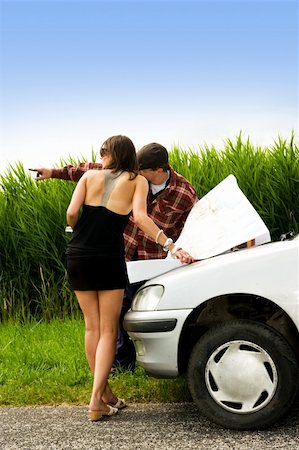 farmer help - Farmer giving directions to a beautiful woman, lost in the country side Stock Photo - Budget Royalty-Free & Subscription, Code: 400-04622067