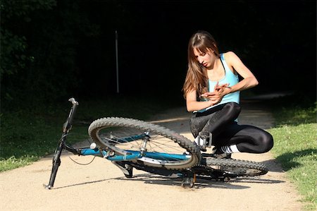 person tumble - Female bike rider takes a tumble in the park Stock Photo - Budget Royalty-Free & Subscription, Code: 400-04622327