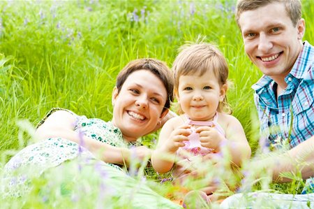 simsearch:400-07715953,k - A family having rest in the meadow Stock Photo - Budget Royalty-Free & Subscription, Code: 400-04622512