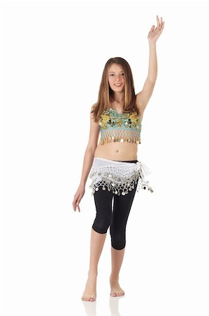 simsearch:400-05154700,k - Young Caucasian belly dancing girl in beautiful decorated clothes on white background and reflective floor. Not isolated Stock Photo - Budget Royalty-Free & Subscription, Code: 400-04623139