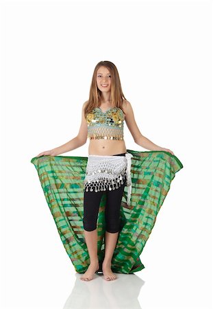 simsearch:400-04627234,k - Young Caucasian belly dancing girl in beautiful decorated clothes on white background and reflective floor. Not isolated Foto de stock - Super Valor sin royalties y Suscripción, Código: 400-04623148
