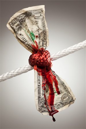 simsearch:400-05062045,k - Wrinkled American Dollar Tied Up and Bleeding in Rope. Fotografie stock - Microstock e Abbonamento, Codice: 400-04623259