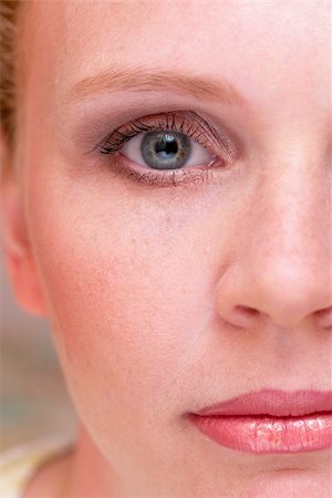 Half of woman face with a makeup macro photo Fotografie stock - Microstock e Abbonamento, Codice: 400-04623712