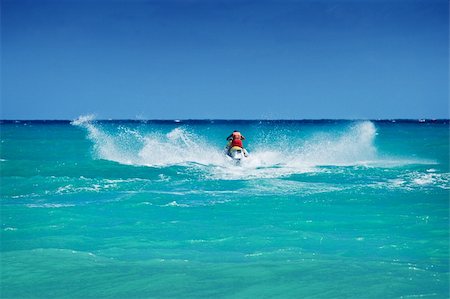 dimol (artist) - Man riding jet ski in Caribbean sea Stock Photo - Budget Royalty-Free & Subscription, Code: 400-04634086