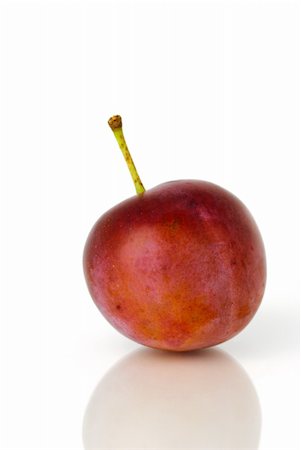 Plum before white background. Stock Photo - Budget Royalty-Free & Subscription, Code: 400-04634118