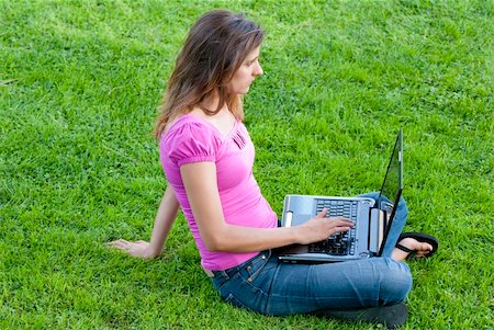 simsearch:6109-06003526,k - Woman with laptop sit relaxed green grass Stock Photo - Budget Royalty-Free & Subscription, Code: 400-04634121