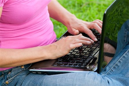 simsearch:6109-06003526,k - Woman with laptop sit relaxed green grass Stock Photo - Budget Royalty-Free & Subscription, Code: 400-04634122