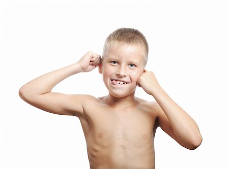 young boy pulling a funny face isolated on white background Stock Photo - Budget Royalty-Free & Subscription, Code: 400-04634214