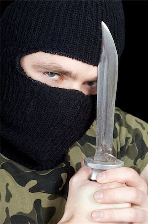 simsearch:400-07779478,k - Portrait of  the criminal with a knife Stock Photo - Budget Royalty-Free & Subscription, Code: 400-04634484