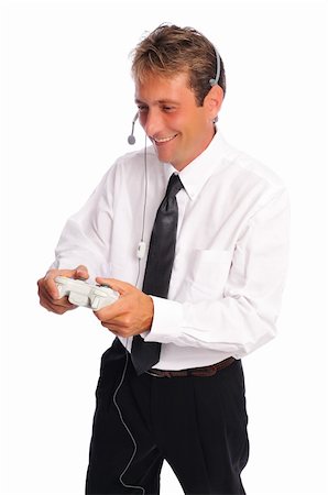 business man taking a break to play video games set on a white background Stock Photo - Budget Royalty-Free & Subscription, Code: 400-04635383