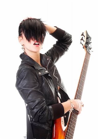 simsearch:400-05876406,k - Punk girl holding a guitar and singing, isolated on white Stock Photo - Budget Royalty-Free & Subscription, Code: 400-04635815