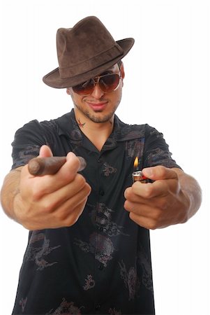 Cool guy offering a cigar Stock Photo - Budget Royalty-Free & Subscription, Code: 400-04636101