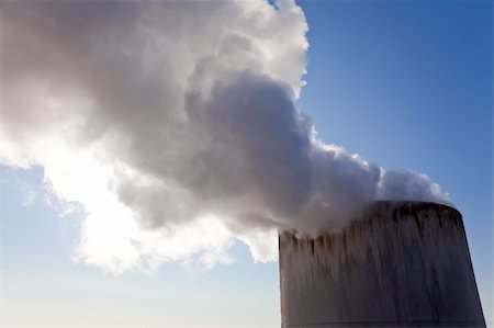 simsearch:400-04623195,k - Close up shot of steam or smoke coming from the top of a chimney. Stock Photo - Budget Royalty-Free & Subscription, Code: 400-04636379