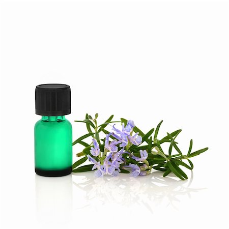 simsearch:400-04154039,k - Rosemary herb leaf sprig in flower with a green aromatherapy essential oil bottle, over white background. Stock Photo - Budget Royalty-Free & Subscription, Code: 400-04636373