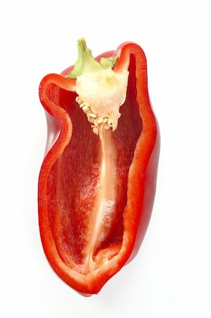 simsearch:400-06092107,k - Half cut macro red pepper isolated over white background Fotografie stock - Microstock e Abbonamento, Codice: 400-04636446