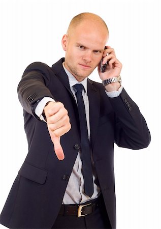simsearch:400-09030070,k - Businessman with bad news on his cell phone disaproving Fotografie stock - Microstock e Abbonamento, Codice: 400-04636879