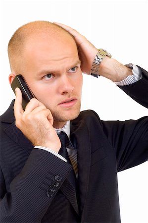 simsearch:400-09030070,k - young businessman with bad news on his cell phone Fotografie stock - Microstock e Abbonamento, Codice: 400-04636872