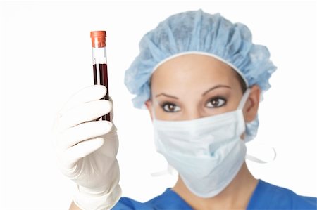 simsearch:400-04746723,k - Beautiful laboratory technician examining a tube of blood Foto de stock - Royalty-Free Super Valor e Assinatura, Número: 400-04637125